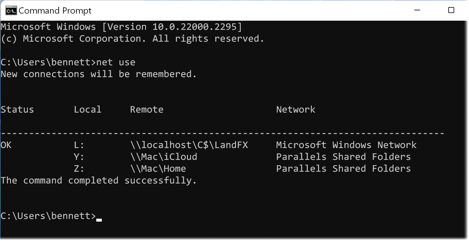 Command prompt showing successful completion of the net use command